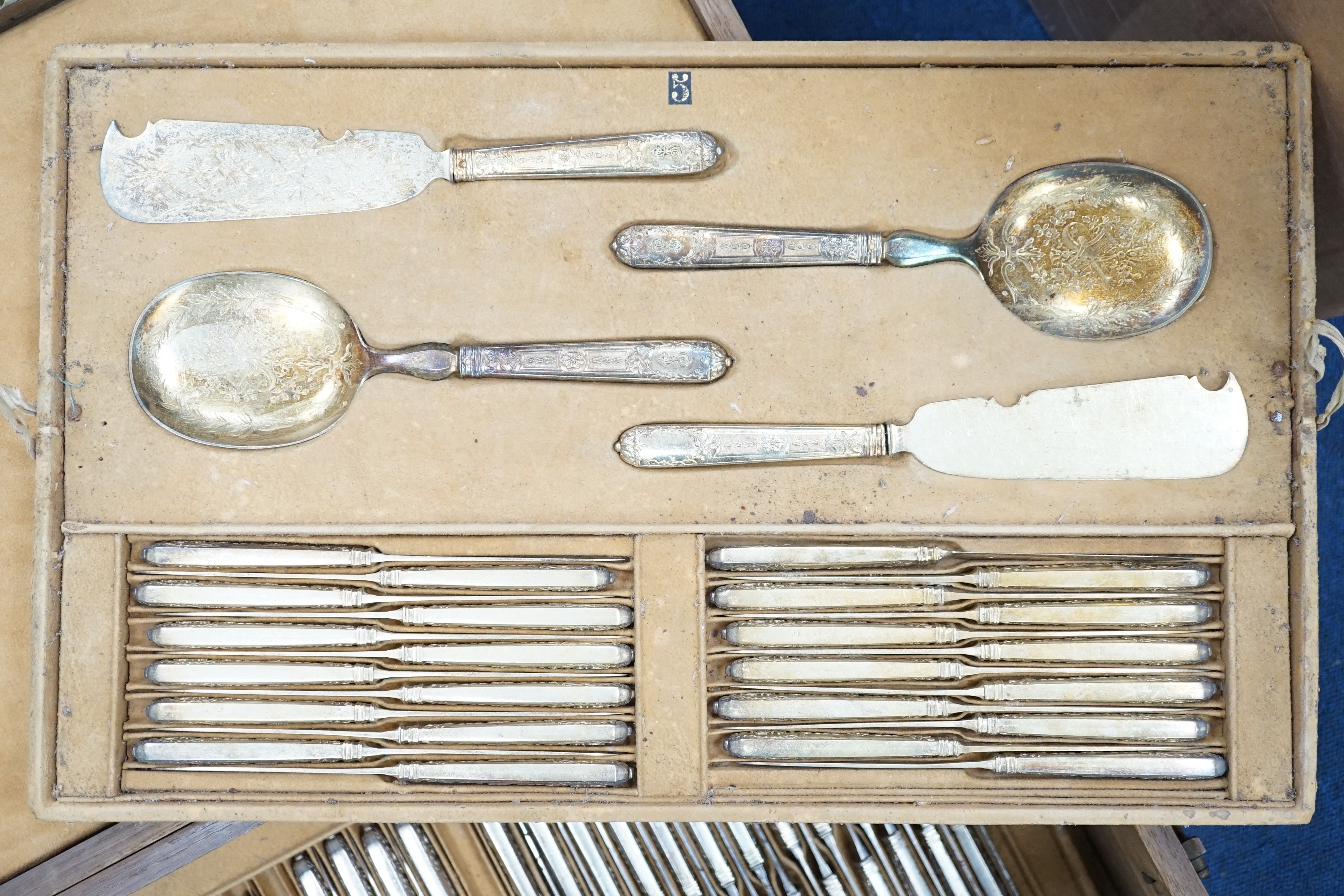 An extensive, almost complete canteen of late 19th/early 20th century French 950 standard silver fancy pattern cutlery, mainly by Gustave Keller of Paris